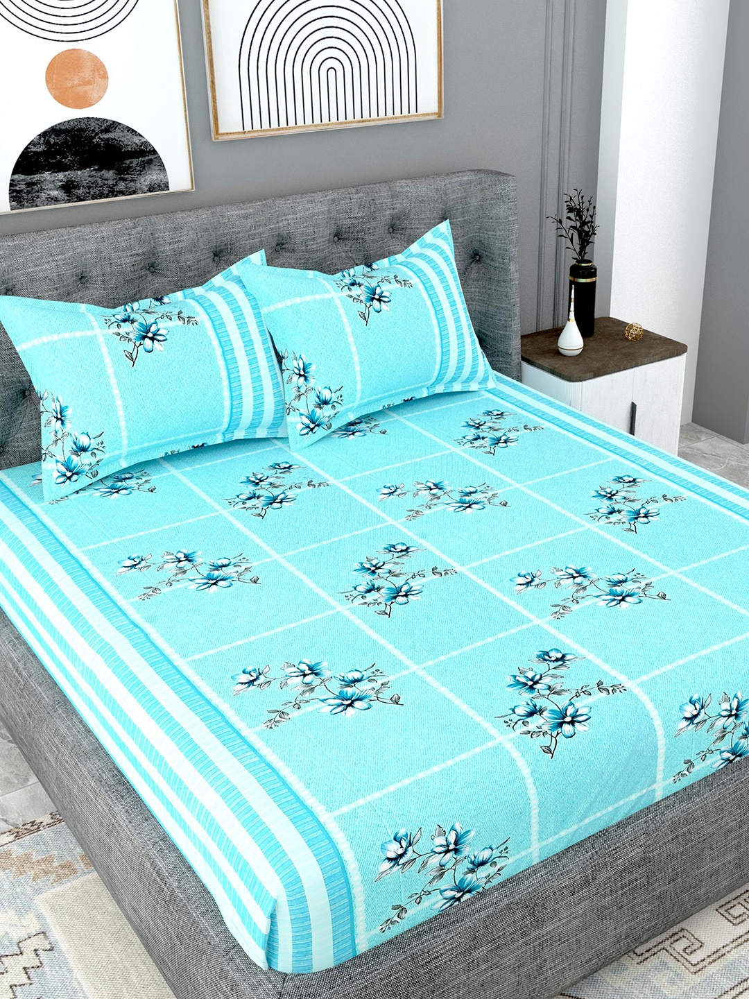

Lali Prints Blue & Black Floral Cotton 180 TC King Bedsheet with 2 Pillow Covers