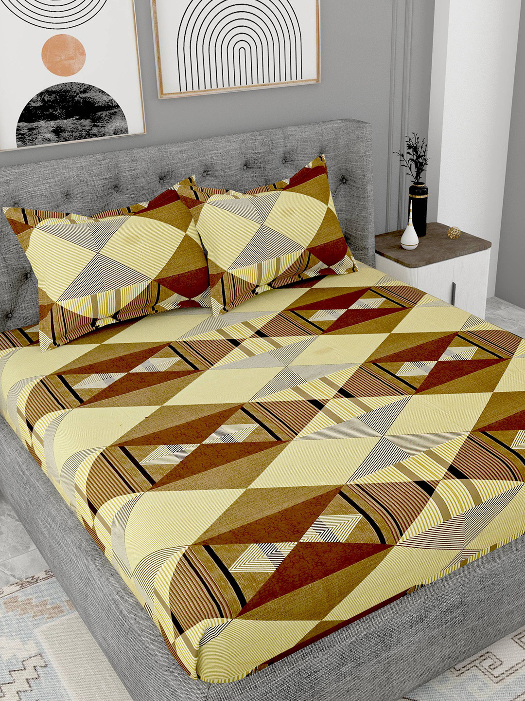 

Lali Prints Yellow & Brown Printed Cotton 180 TC King Bedsheet with 2 Pillow Covers