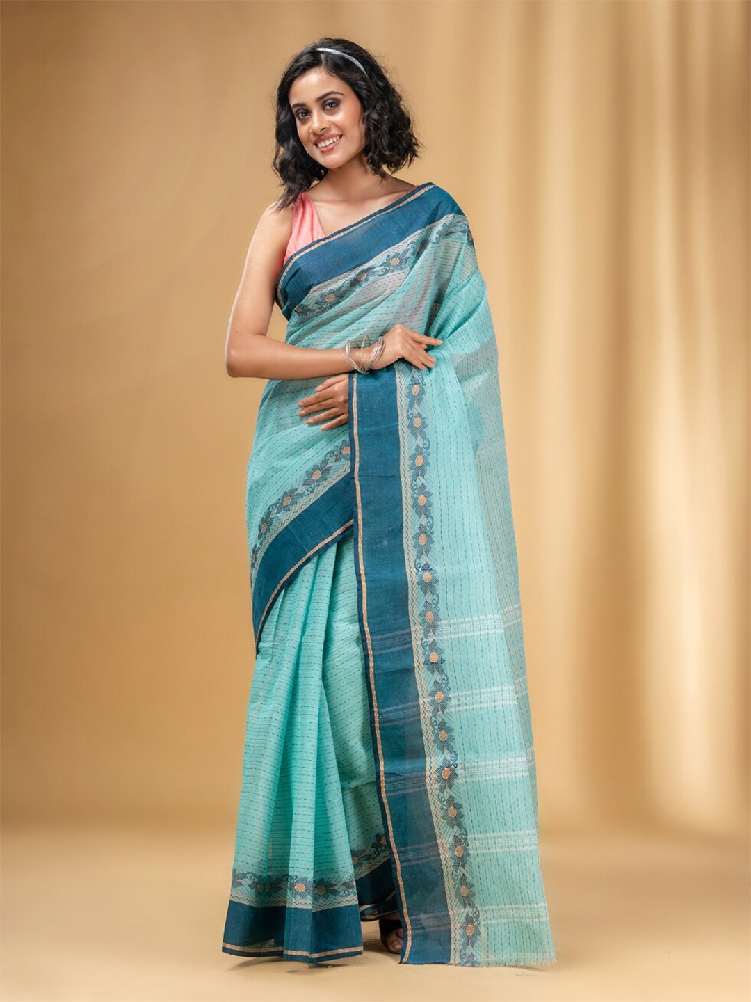 

Charukriti Ethnic Motifs Woven Design Pure Cotton Taant Saree, Sea green