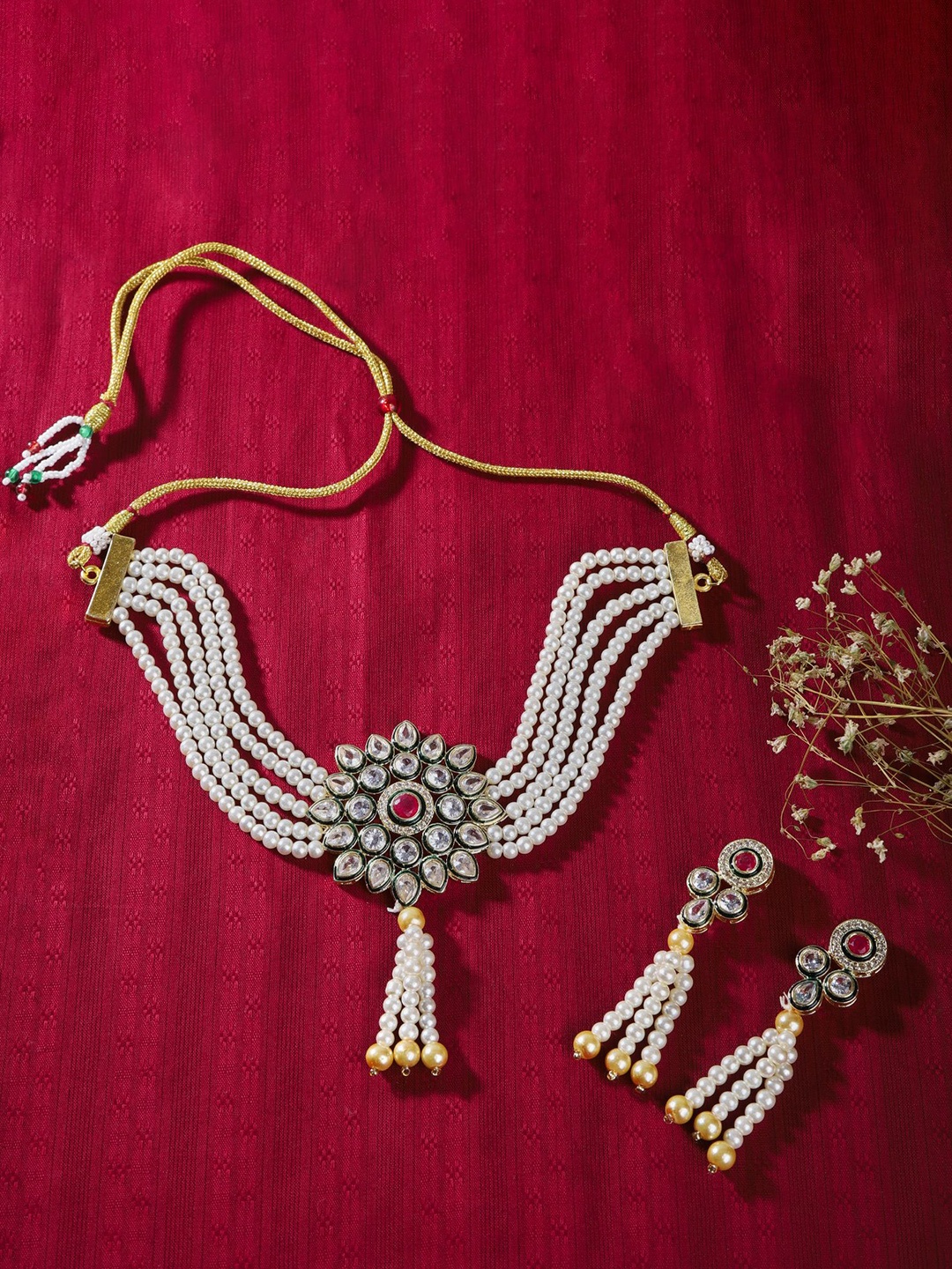 

The Pari Gold-Plated AD Studded & Beaded Jewellery Set