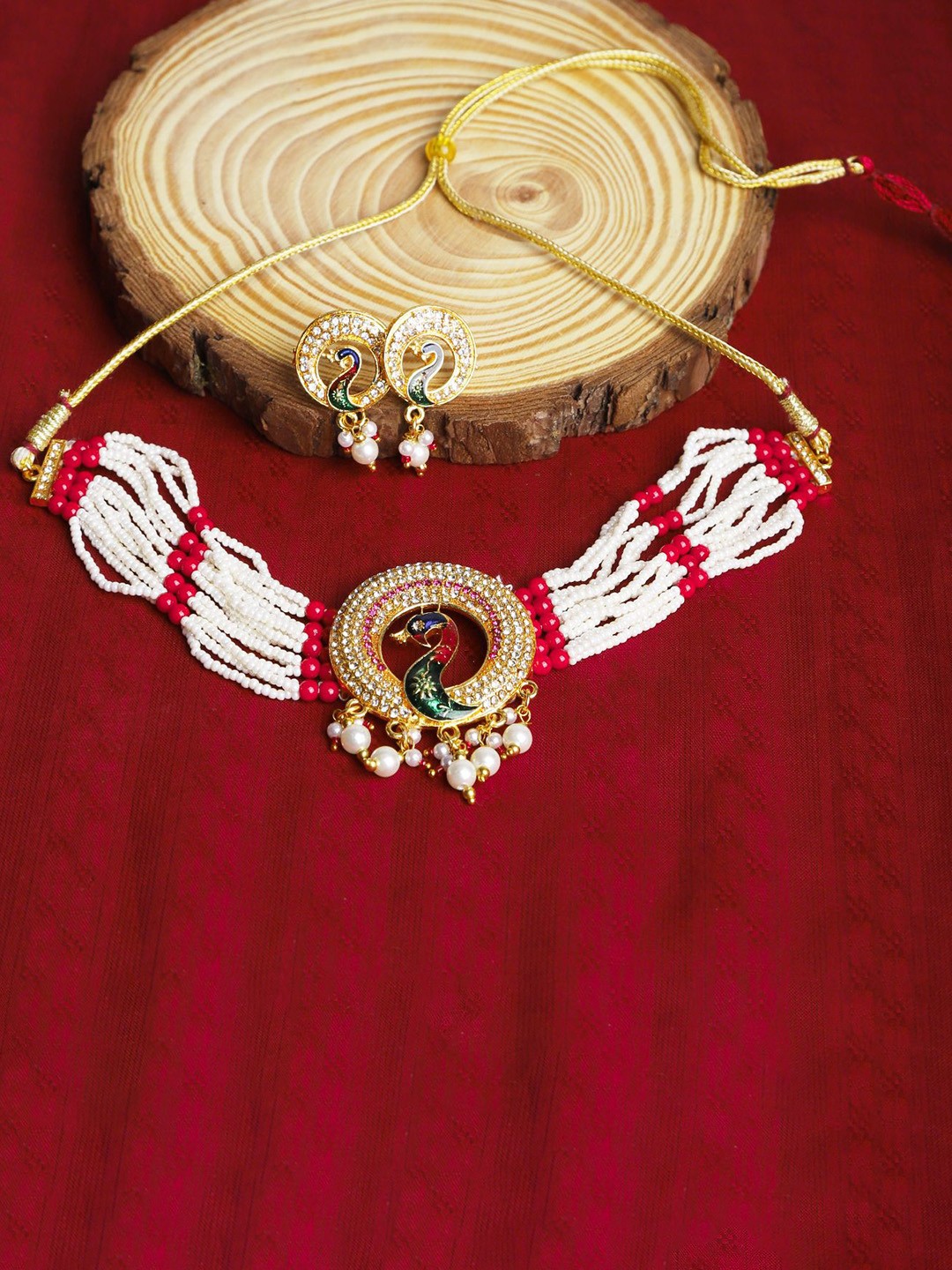 

The Pari Gold-Plated Stone-Studded & Beaded Jewellery Set