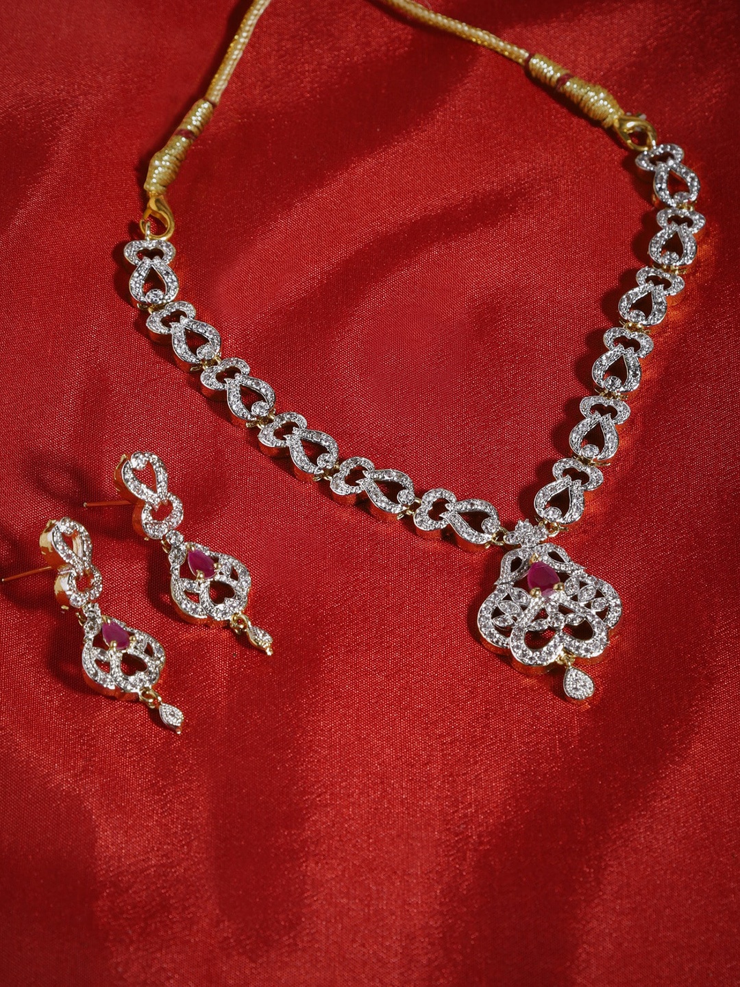 

The Pari Gold-Plated AD-Studded & Beaded Jewellery Set