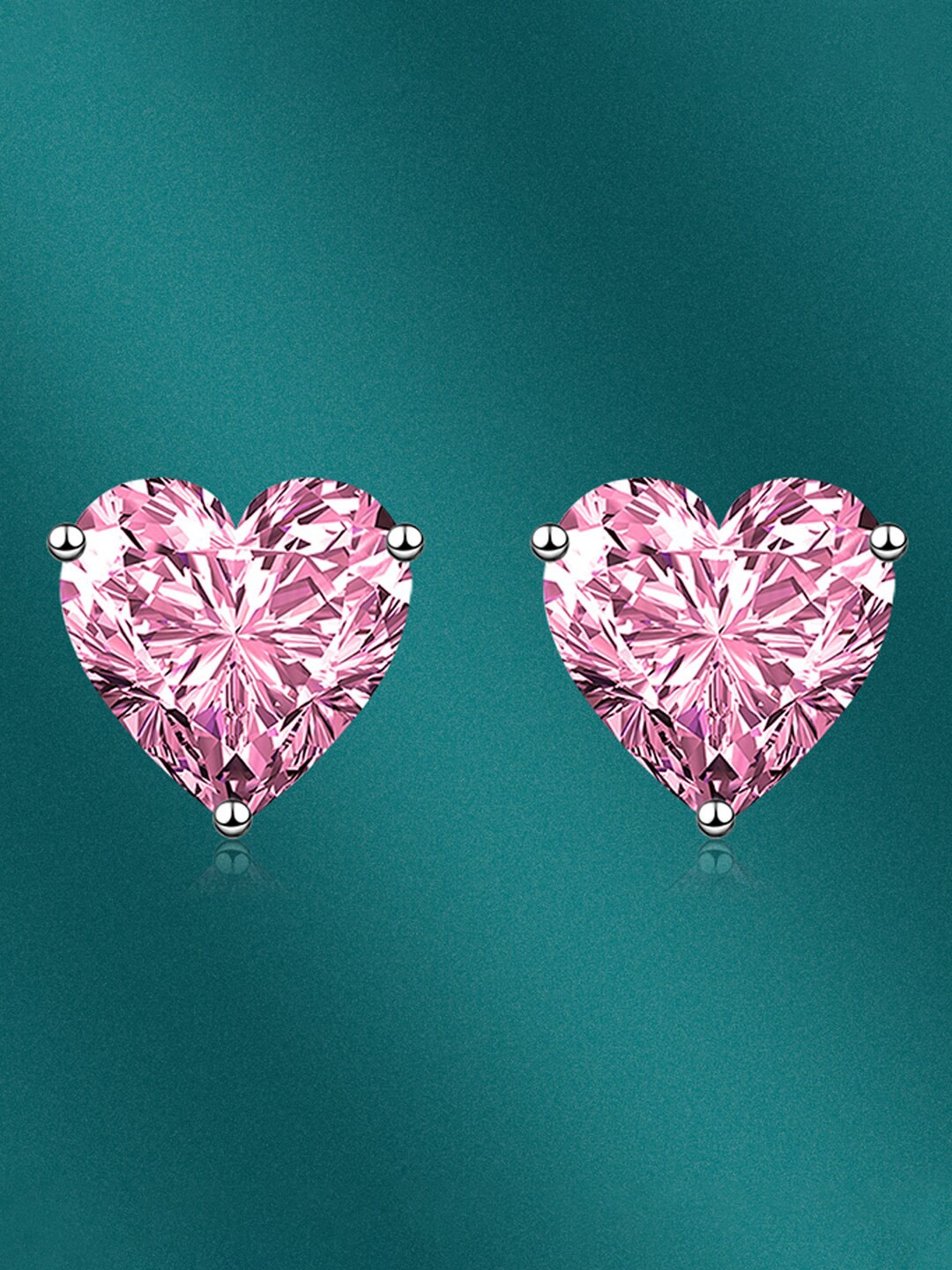 

Designs & You Silver Plated Heart Shaped Stud Earrings
