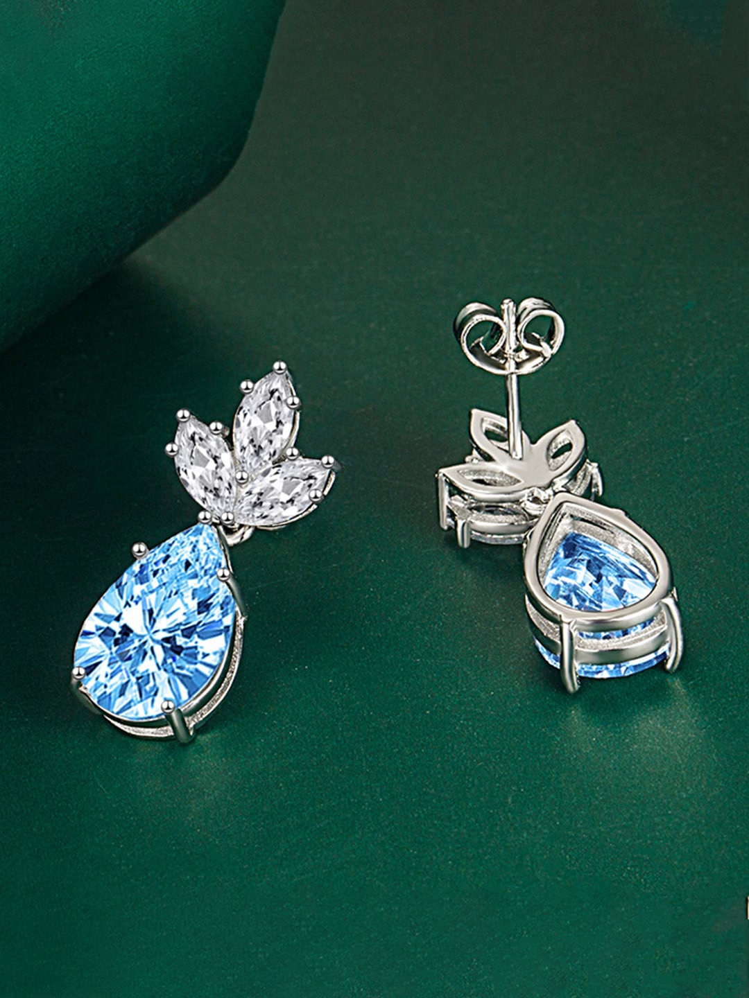 

Designs & You Silver-Plated Teardrop Shaped Drop Earrings