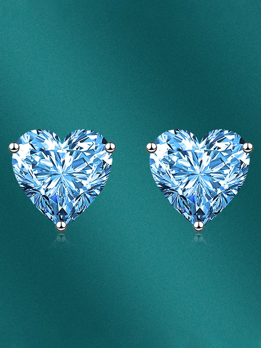 

Designs & You Silver-Plated Heart Shaped Studs Earrings