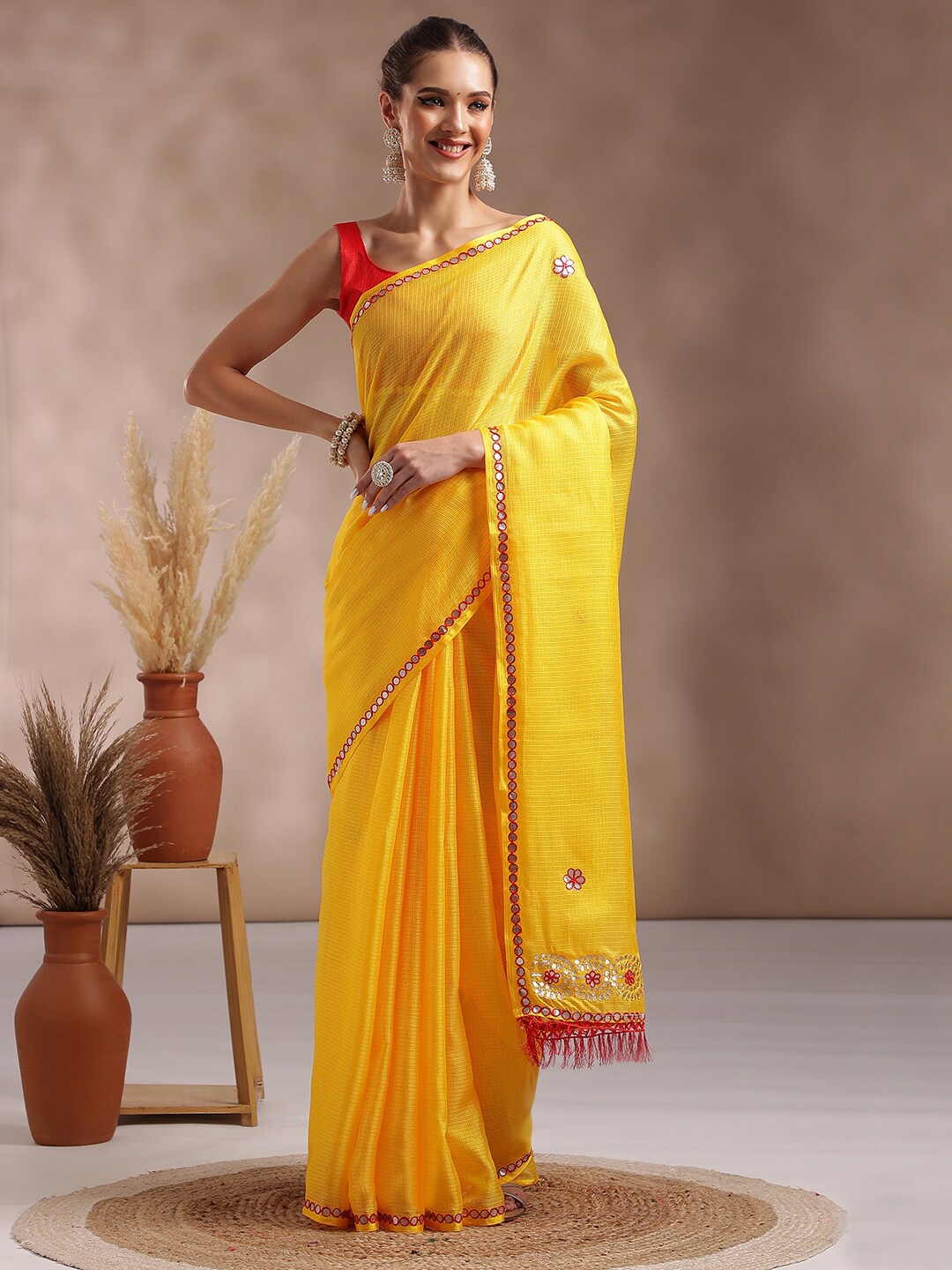 

Saree mall Yellow & Red Woven Design Embroidered Mirror Work Saree