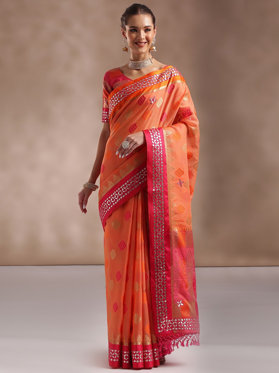 

Saree mall Orange & Pink Ethnic Motifs Woven Design Mirror Work Saree
