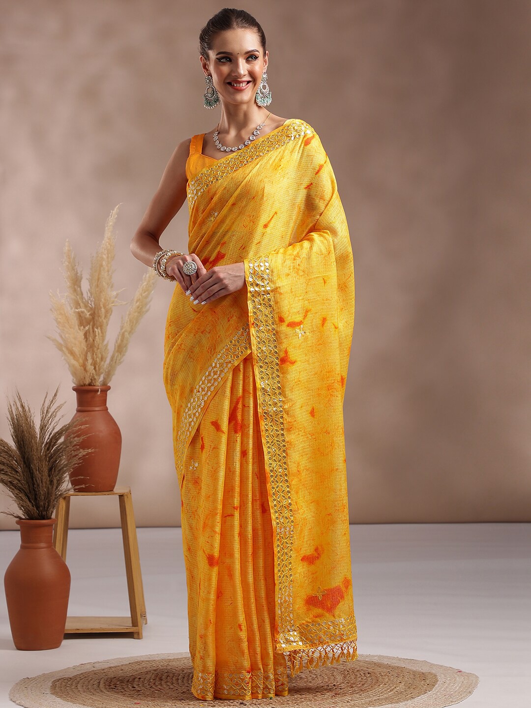 

Saree mall Yellow & Red Tie and Dye Mirror Work Saree