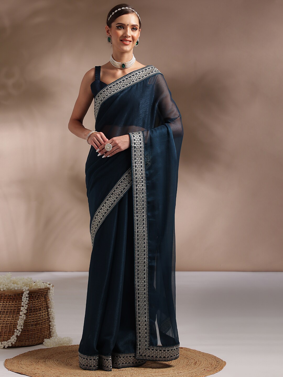 

Saree mall Teal Silver-Toned Embroidered Poly Georgette Sarees