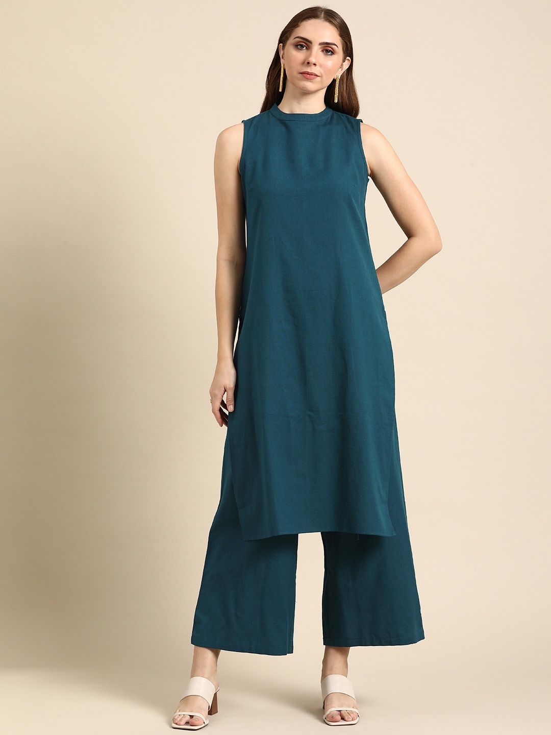 

Anouk Women Solid Round Neck Pure Cotton Kurta, Teal