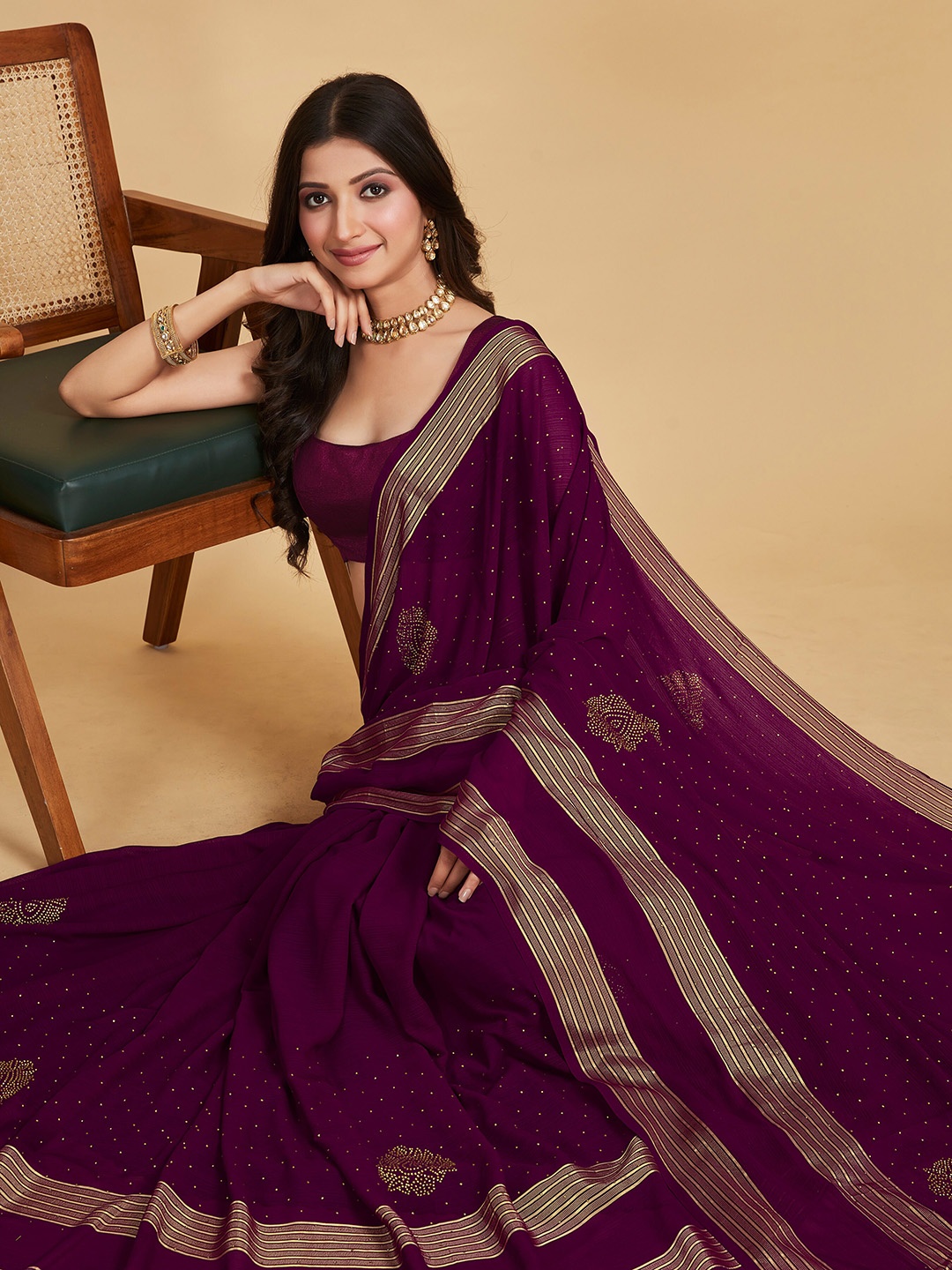 

Sangria Burgundy Embellished Striped Border Saree