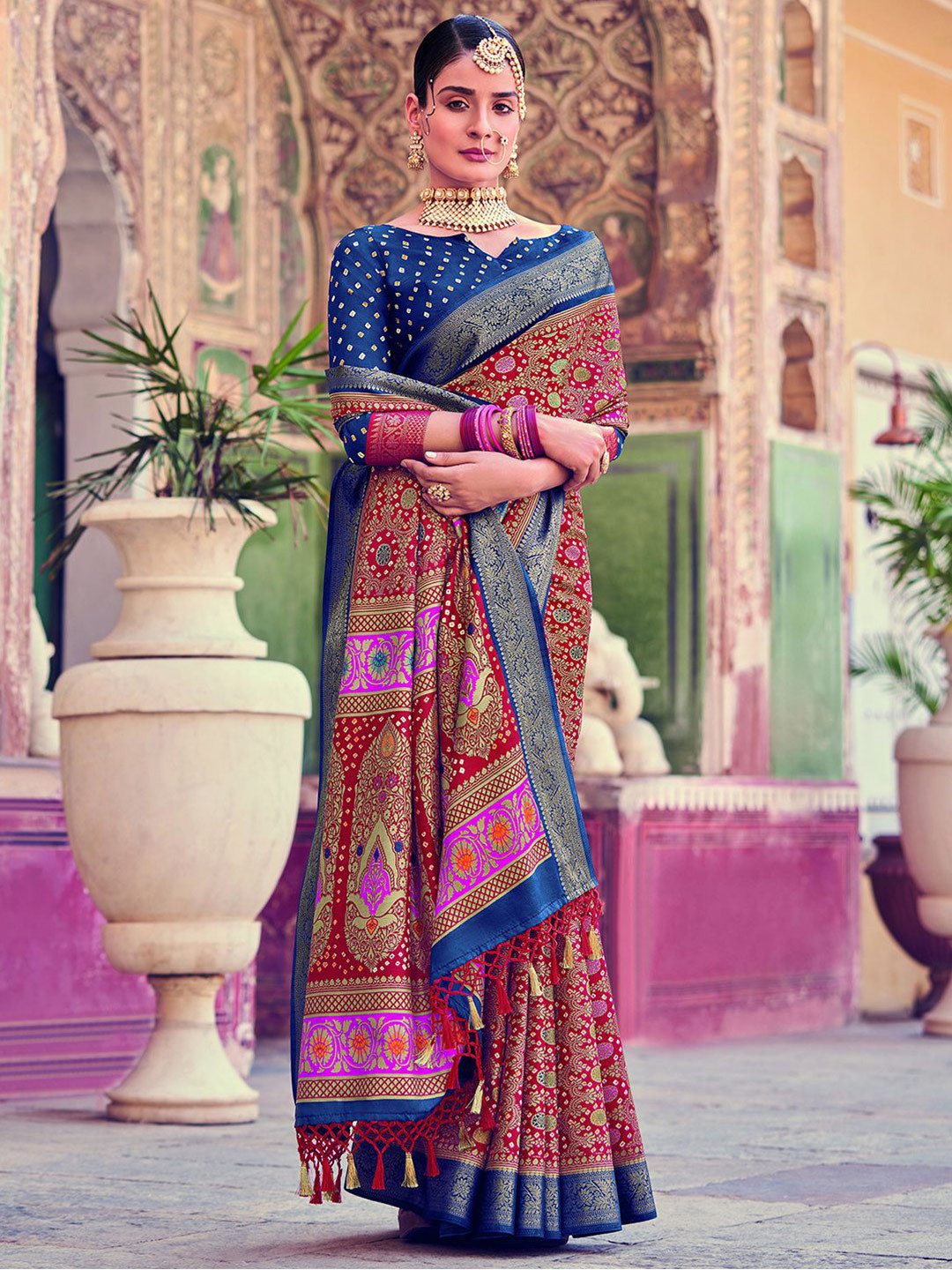 

Mitera Red & Navy Blue Ethnic Motifs Printed Zari Bandhani Saree