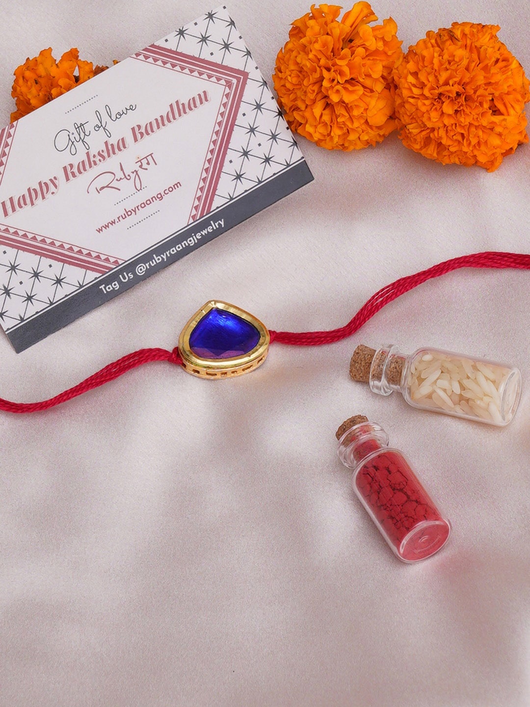 

Ruby Raang Kundan Studded Rakhi with Roli & Rice, Blue