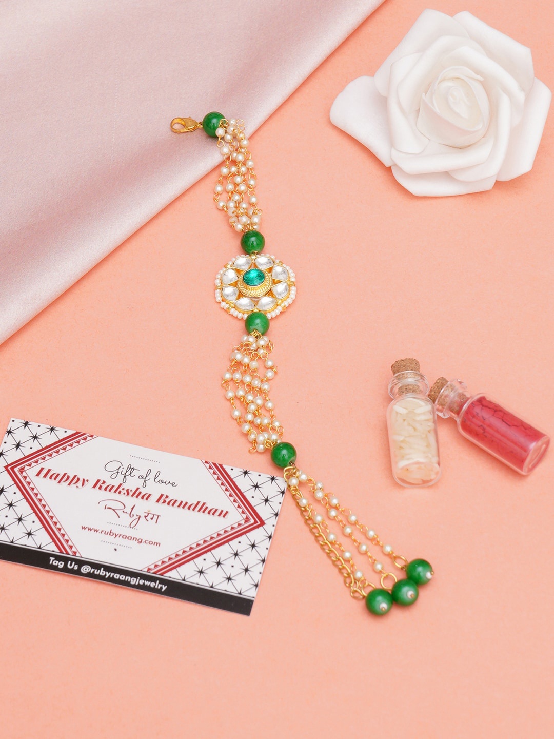 

Ruby Raang Kundan Ston-Studded & Beaded Rakhi With Roli, Rice, Greeting Card & Gift Box, Green