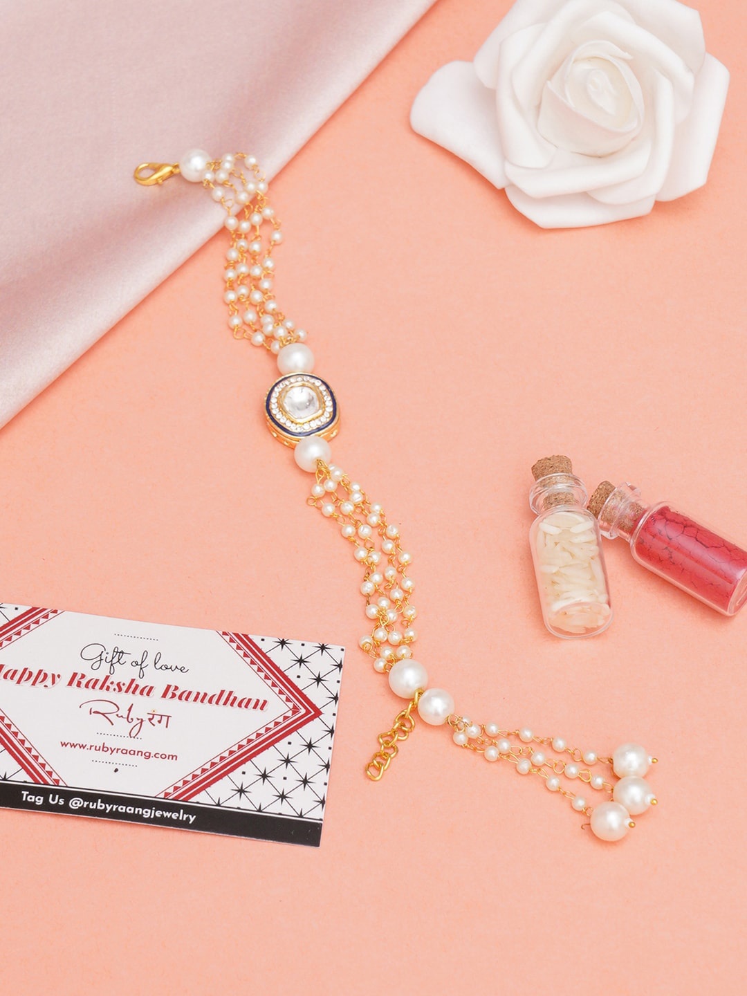

Ruby Raang Kundan-Studded & Beaded Rakhi With Gift Box, White