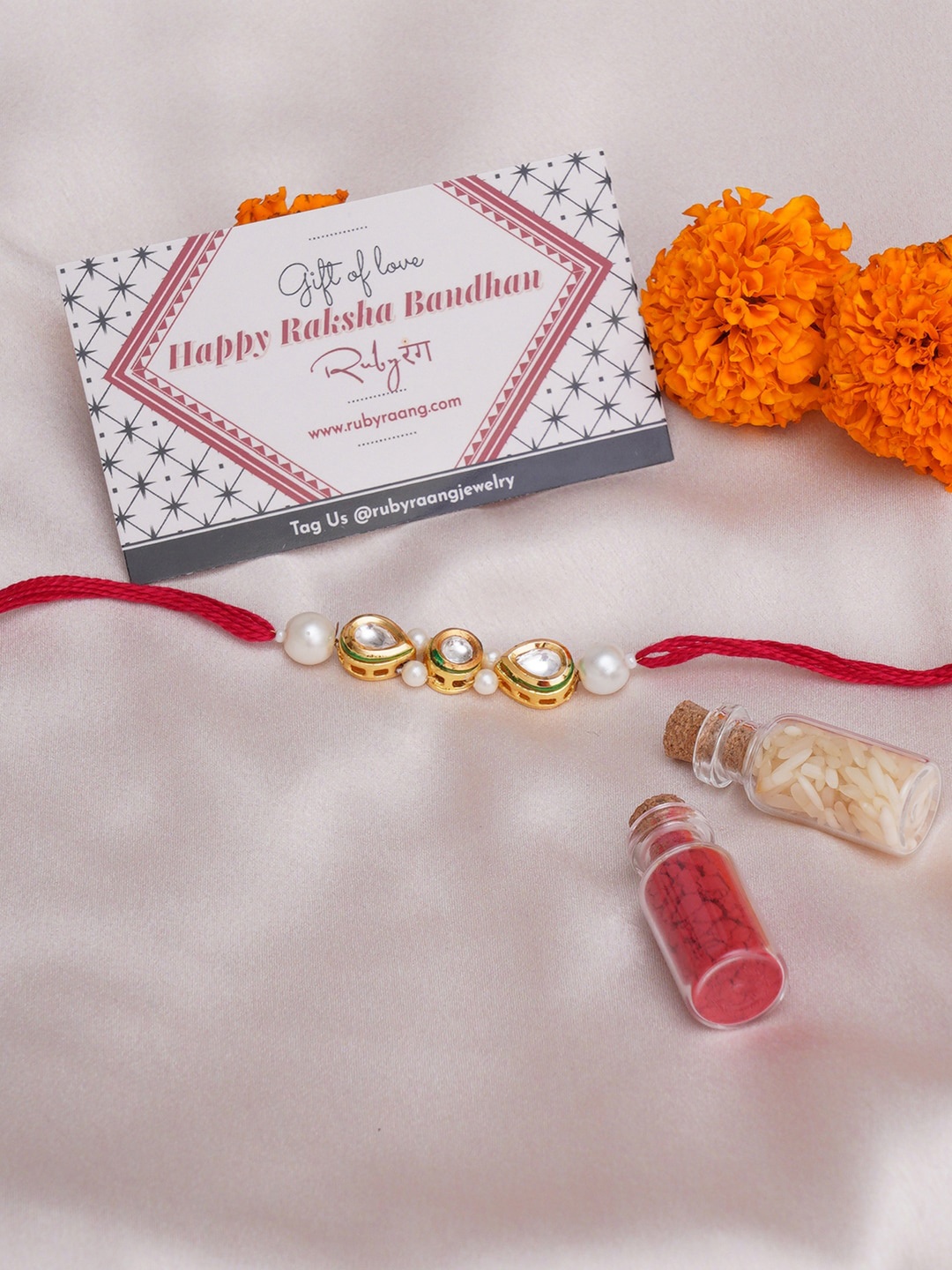 

Ruby Raang Men Kundan-studded Thread Rakhi Gift Box, Gold
