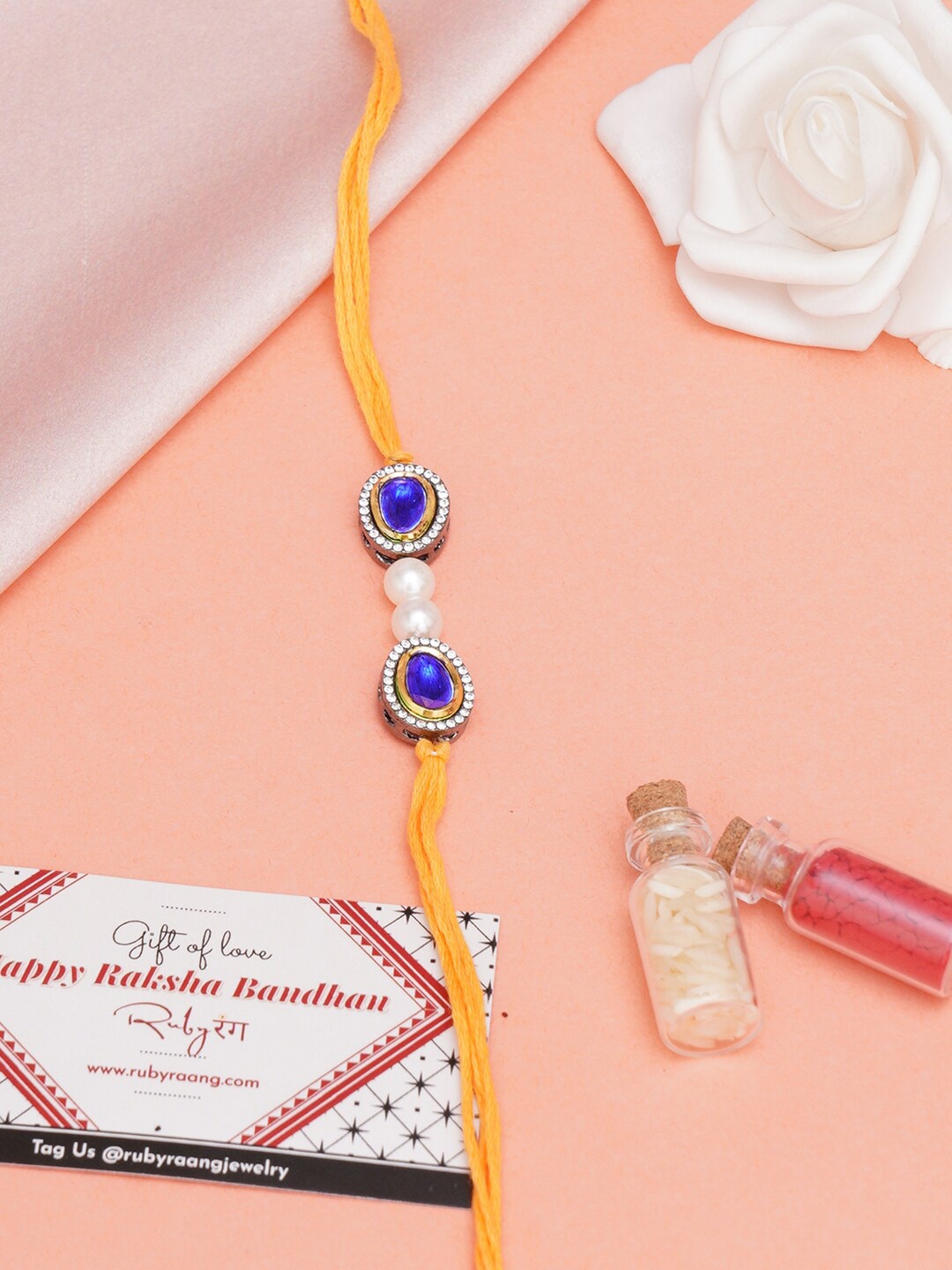 

Ruby Raang Kundan-Studded Thread Rakhi, Yellow