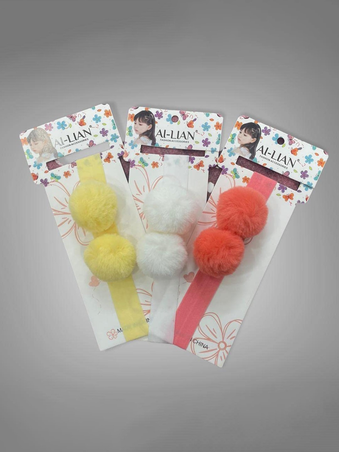 

LYTIX Set Of 3 Pom Pom Balls Headbands, Assorted