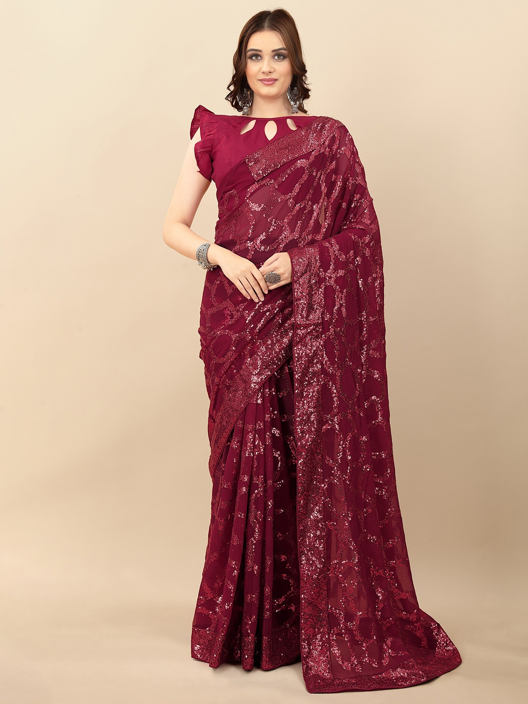 

Mitera Maroon Embellished Sequinned Pure Georgette Saree