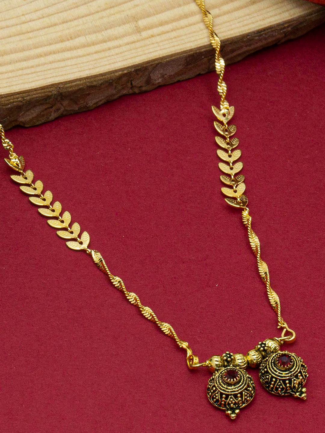 

Ramdev Art Fashion Jwellery Gold-Plated Stone-Studded Mangalsutra