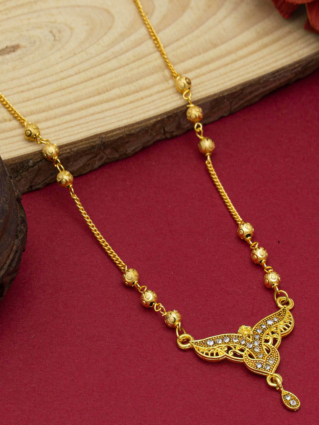 

Ramdev Art Fashion Jwellery Gold-Plated Stone-Studded & Beaded Mangalsutra