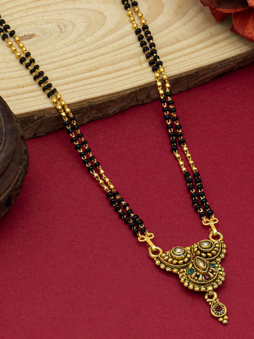 

Ramdev Art Fashion Jwellery Gold-Plated Beaded Mangalsutra