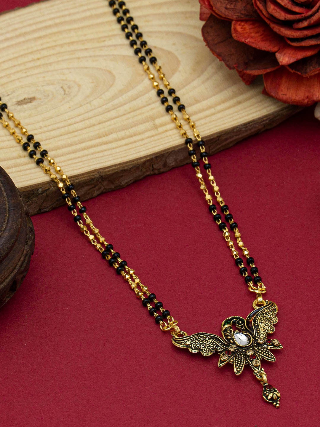 

Ramdev Art Fashion Jwellery Gold-Plated Stone-Studded & Beaded Mangalsutra