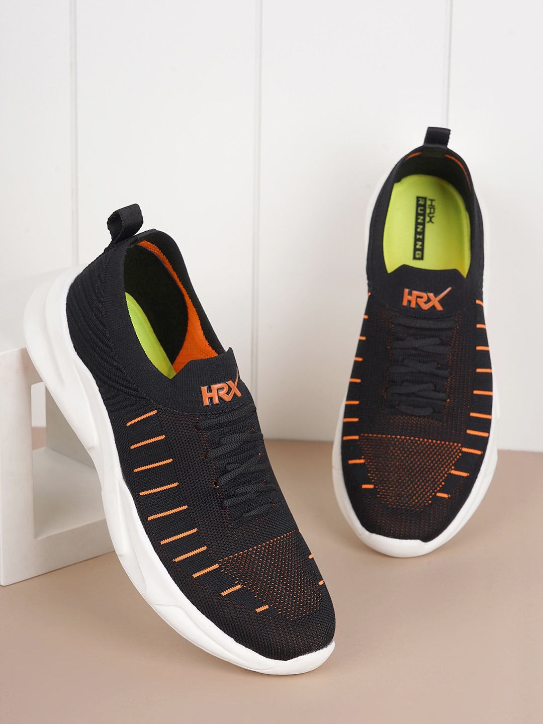 

HRX by Hrithik Roshan Men Black & Orange Striped Contrast Sole Slip On Sneakers