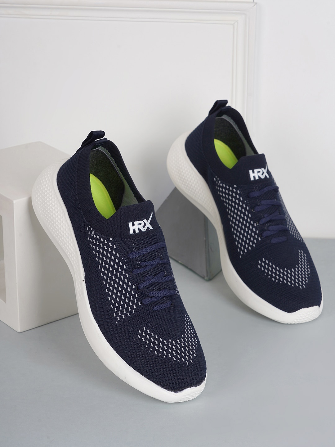 

HRX by Hrithik Roshan Men Navy Blue & Grey Textured Contrast Sole Slip On Sneakers