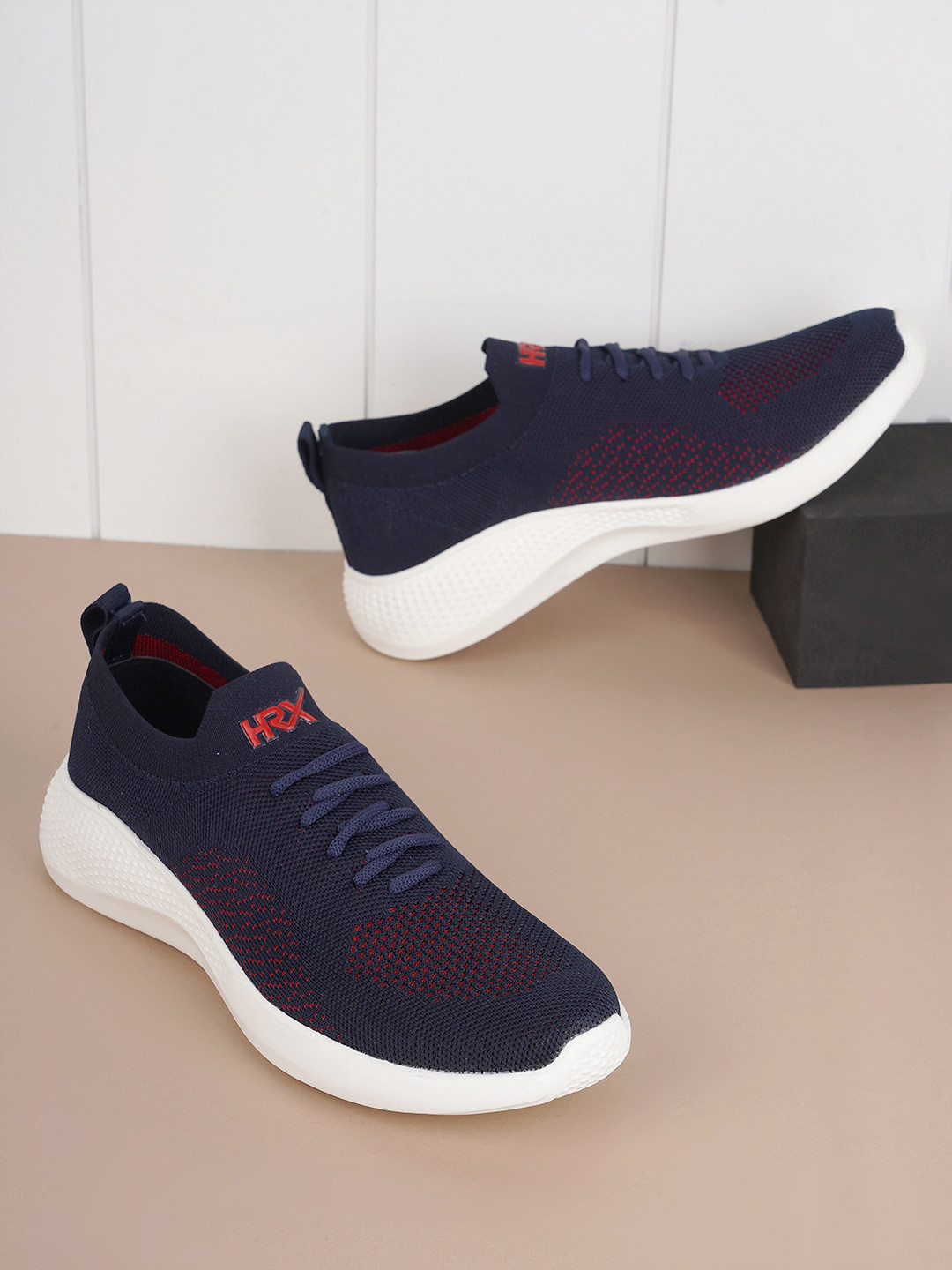 

HRX by Hrithik Roshan Men Navy Blue & Red Textured Contrast Sole Slip on Sneakers