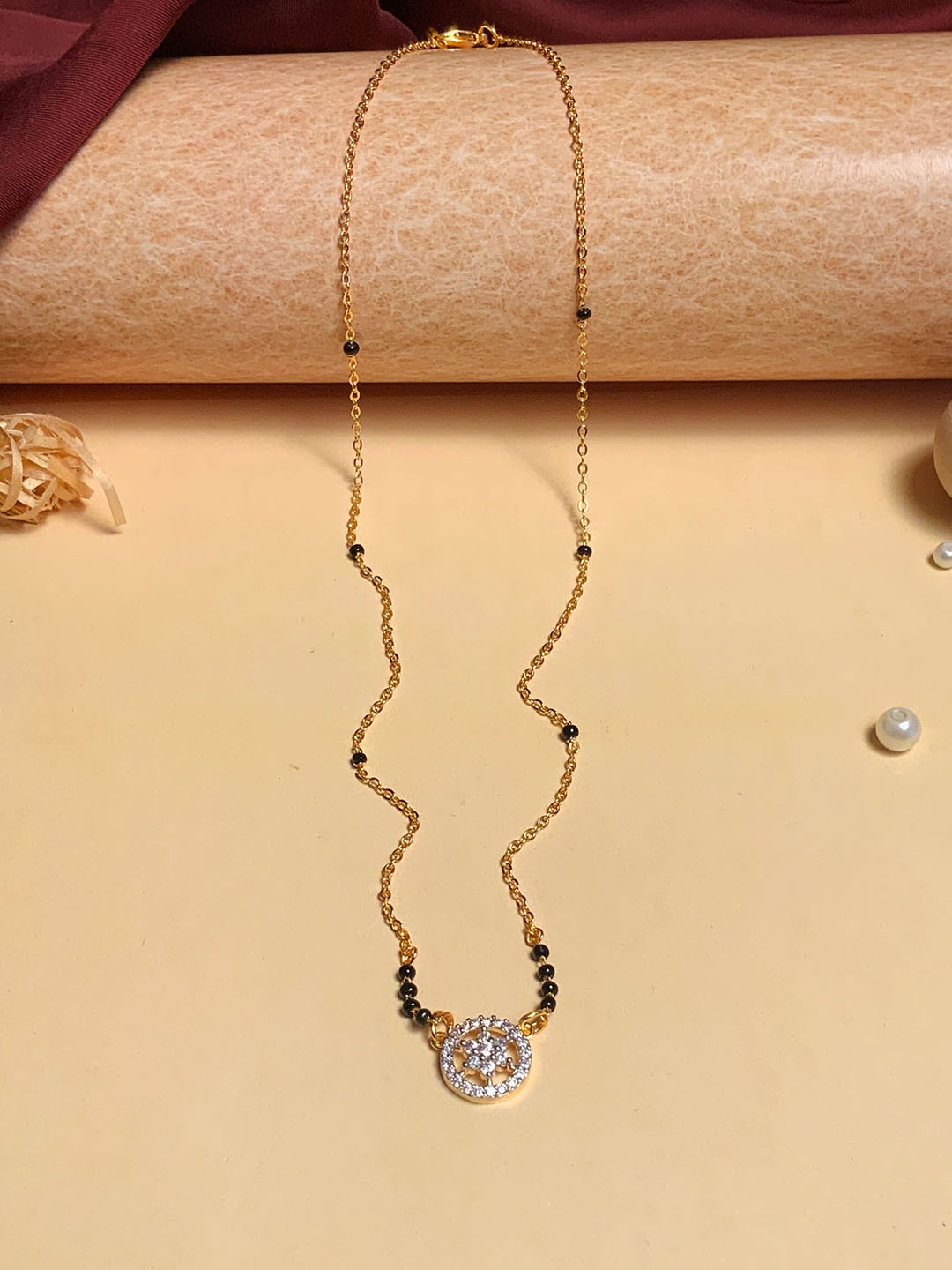 

ABDESIGNS Gold-Plated AD Stone-Studded & Beaded Mangalsutra
