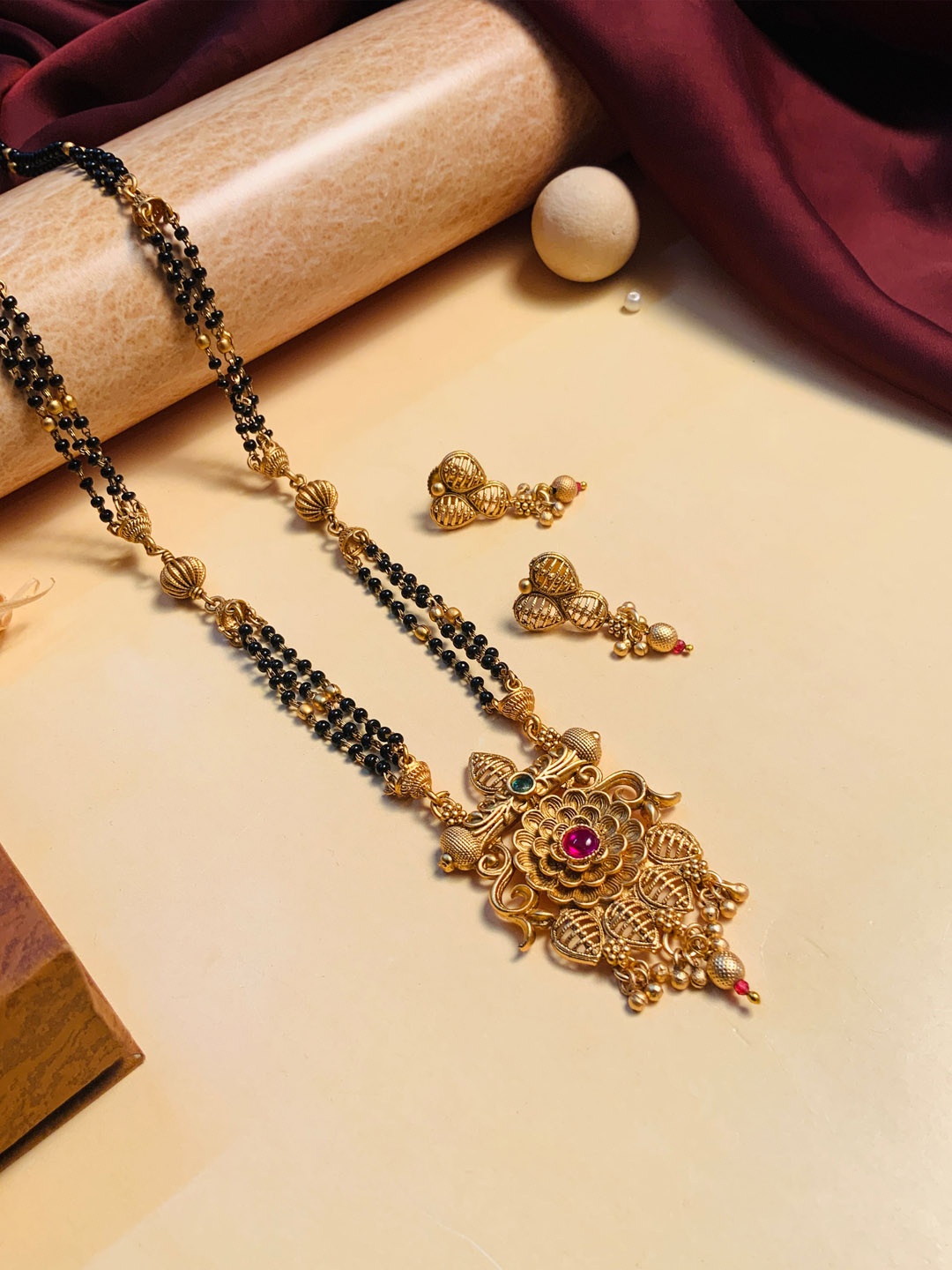 

ABDESIGNS Gold Plated Stone Studded & Beaded Mangalsutra With Earrings