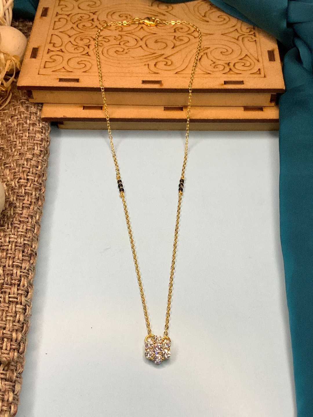 

ABDESIGNS Gold Plated AD Stone Studded & Beaded Mangalsutra