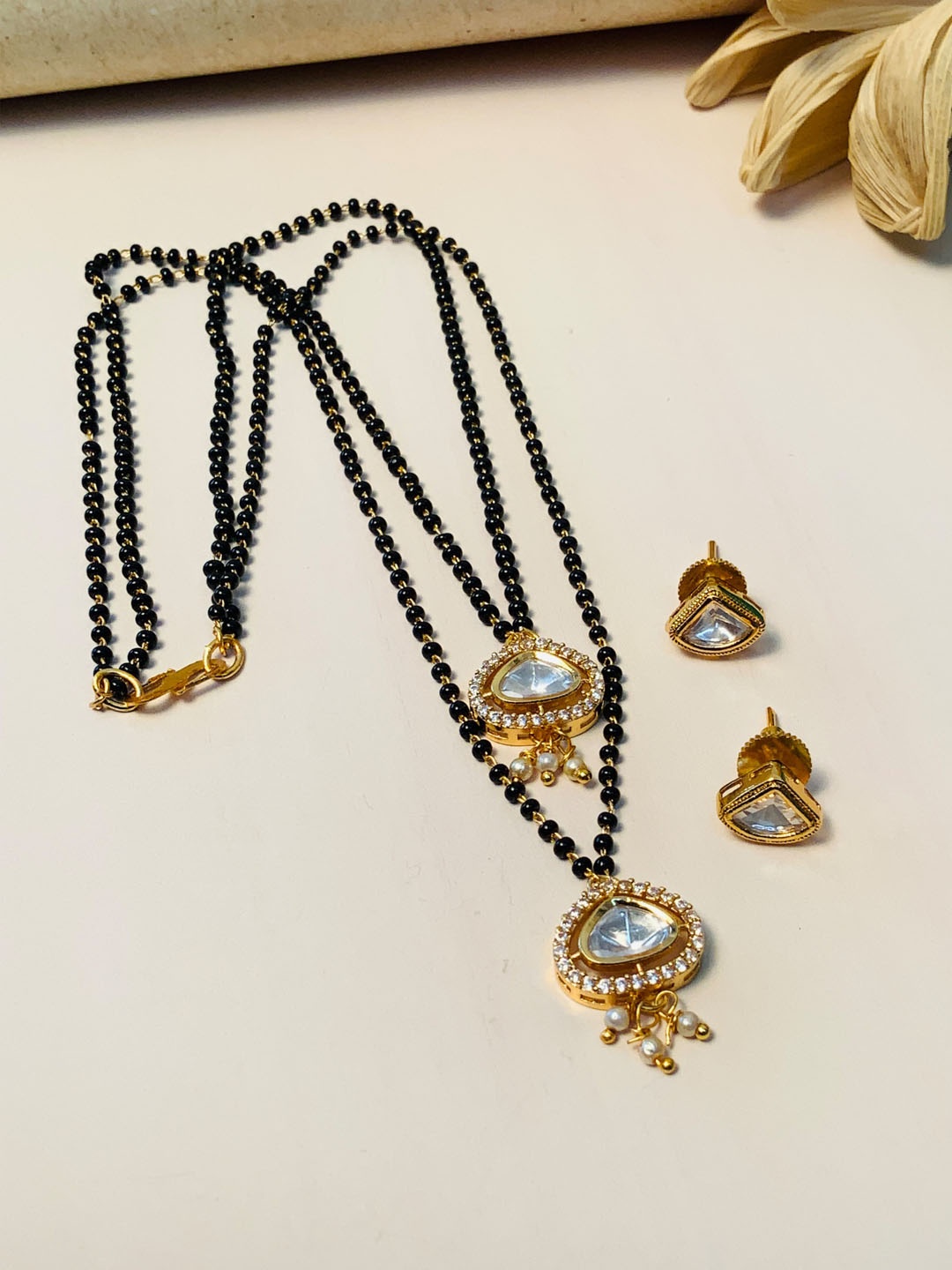 

ABDESIGNS Gold Plated Kundan Studded & Beaded Mangalsutra With Earrings