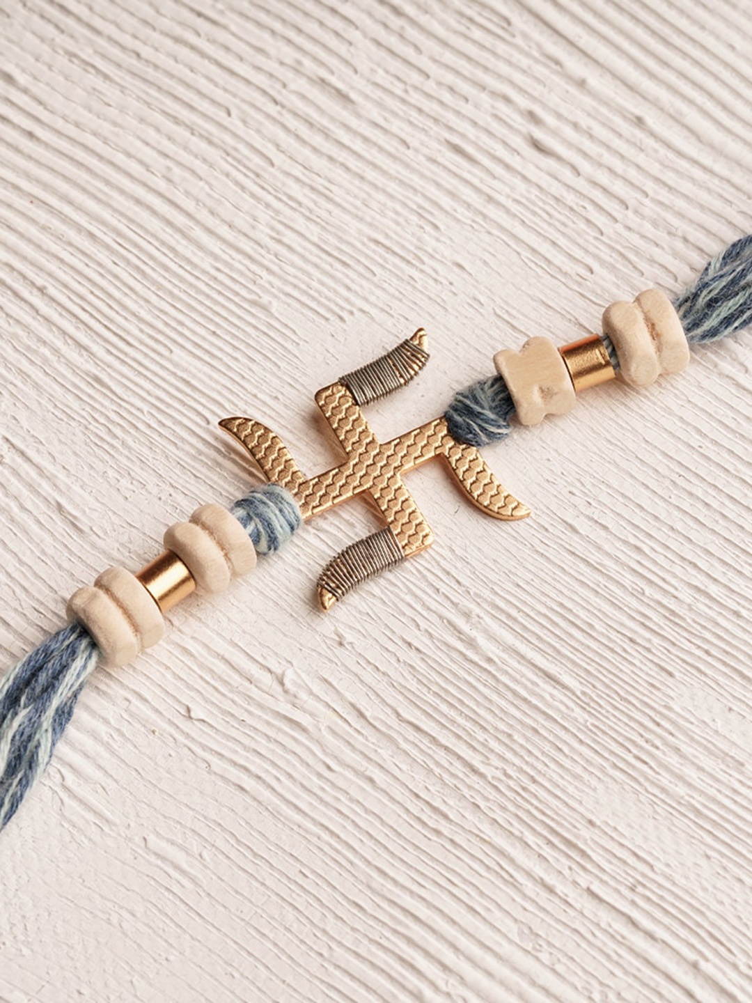 

Suhani Pittie Men 22KT Gold Plated & Swastik Charm Rakhi