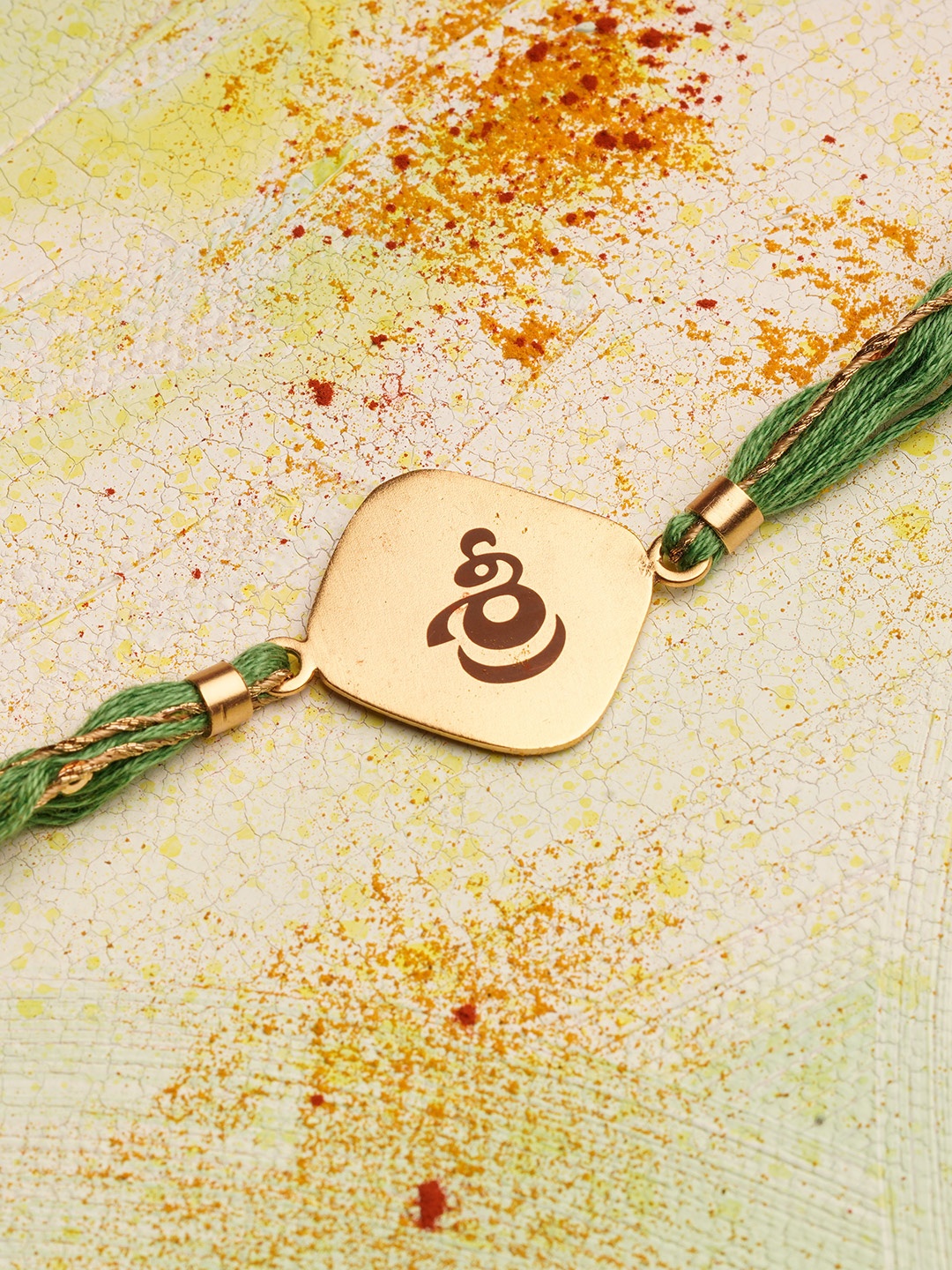 

Suhani Pittie Men 22KT Gold Plated & Telgu Shree Charm Rakhi, Green