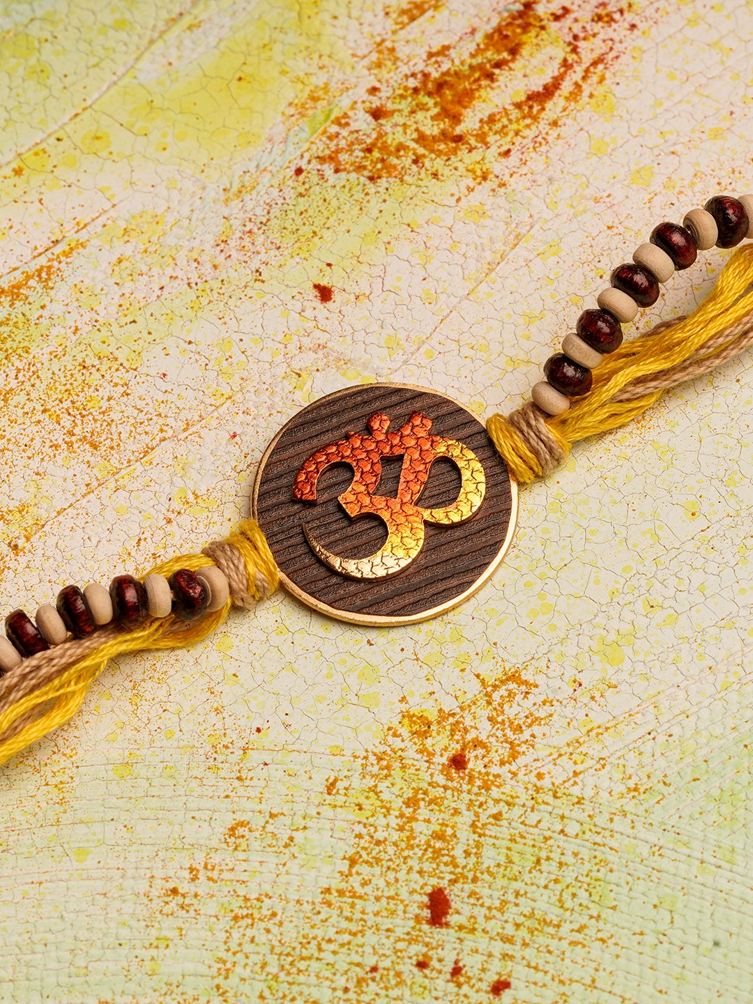 

Suhani Pittie Men 22KT Gold Plated & Om Charm Rakhi