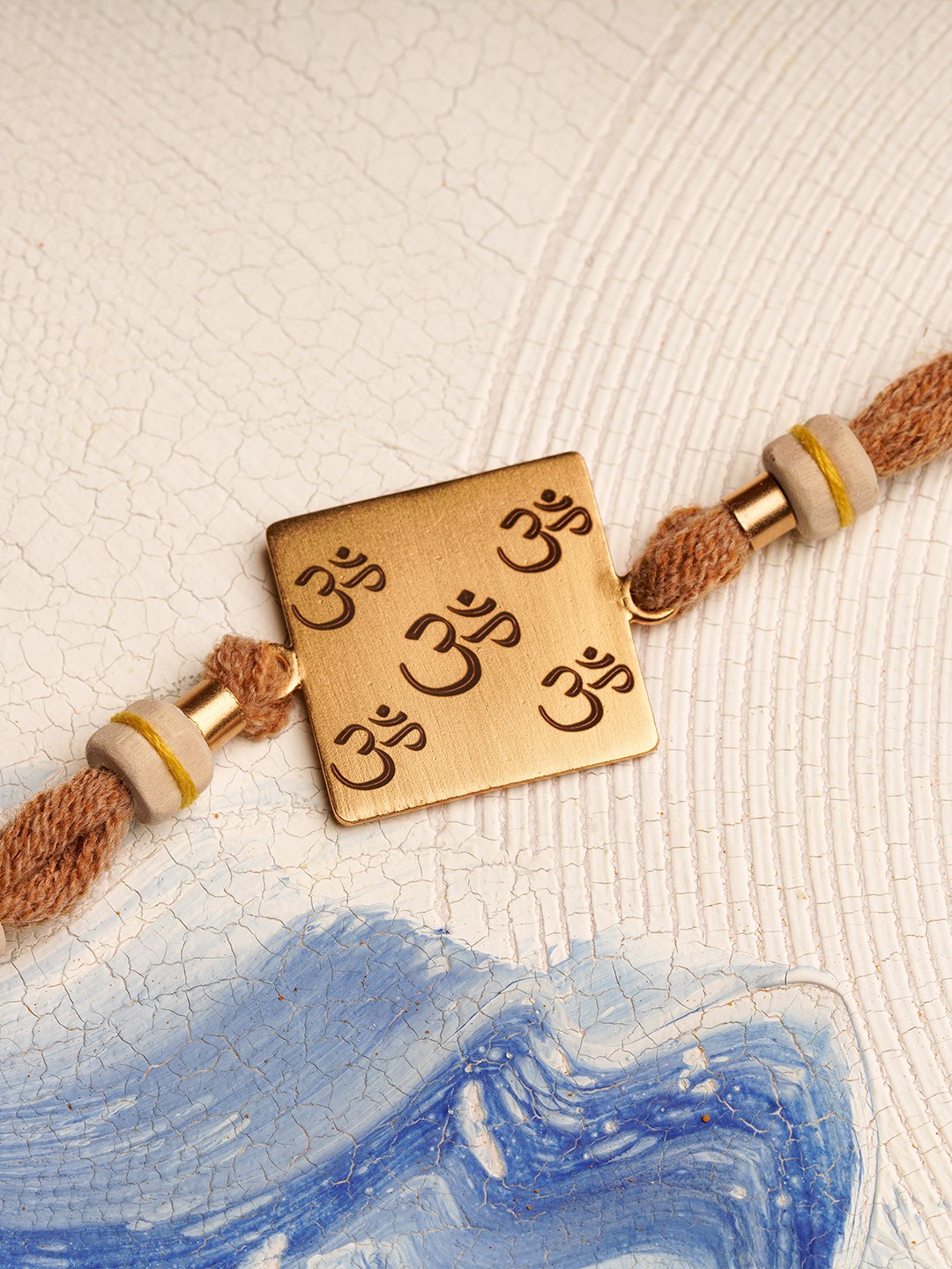 

Suhani Pittie Gold-Plated Tulsi Beaded Rakhi