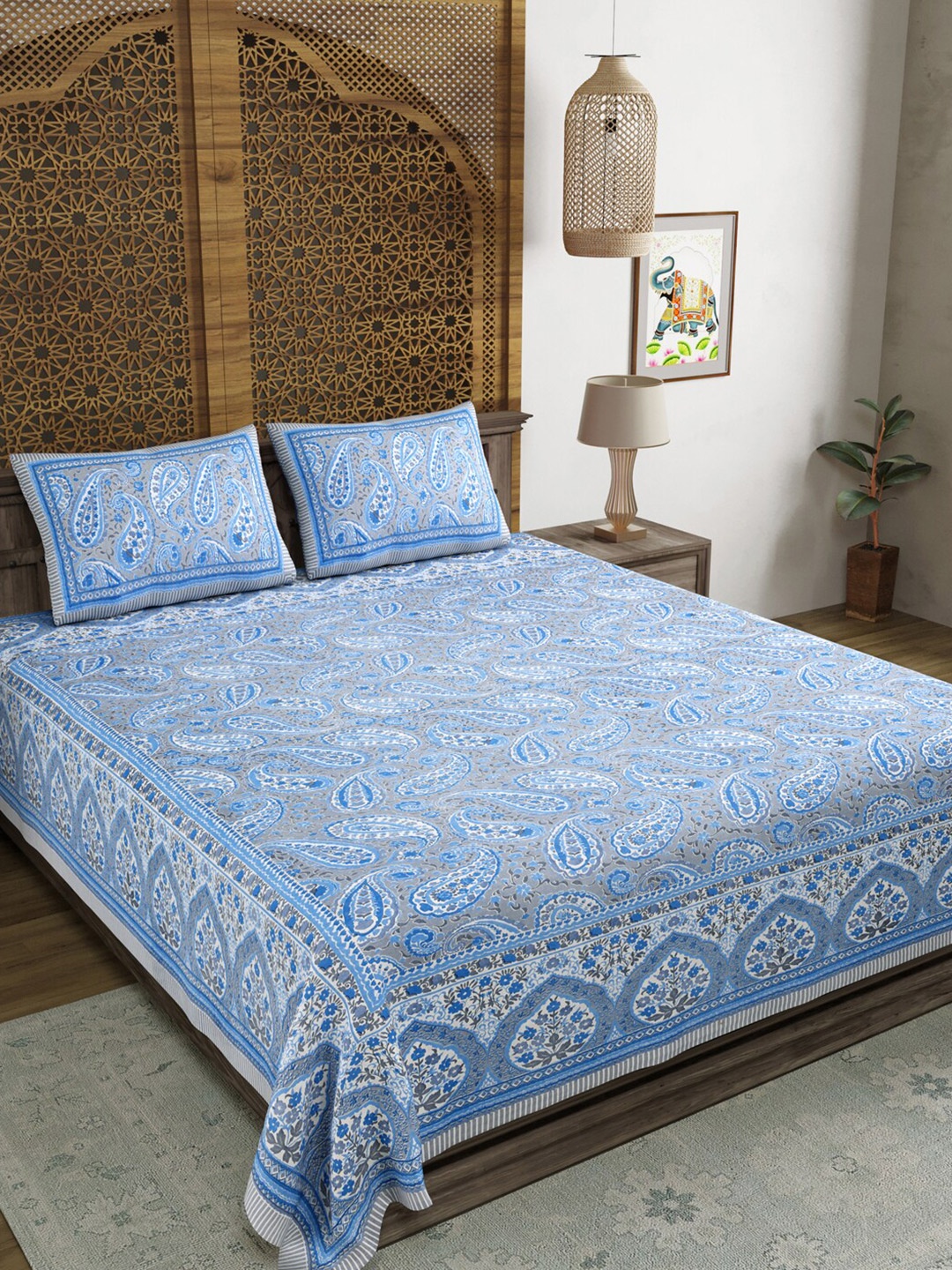 

Sangria Blue Printed Cotton 210 TC Cotton King Bedsheet With Pillow Covers