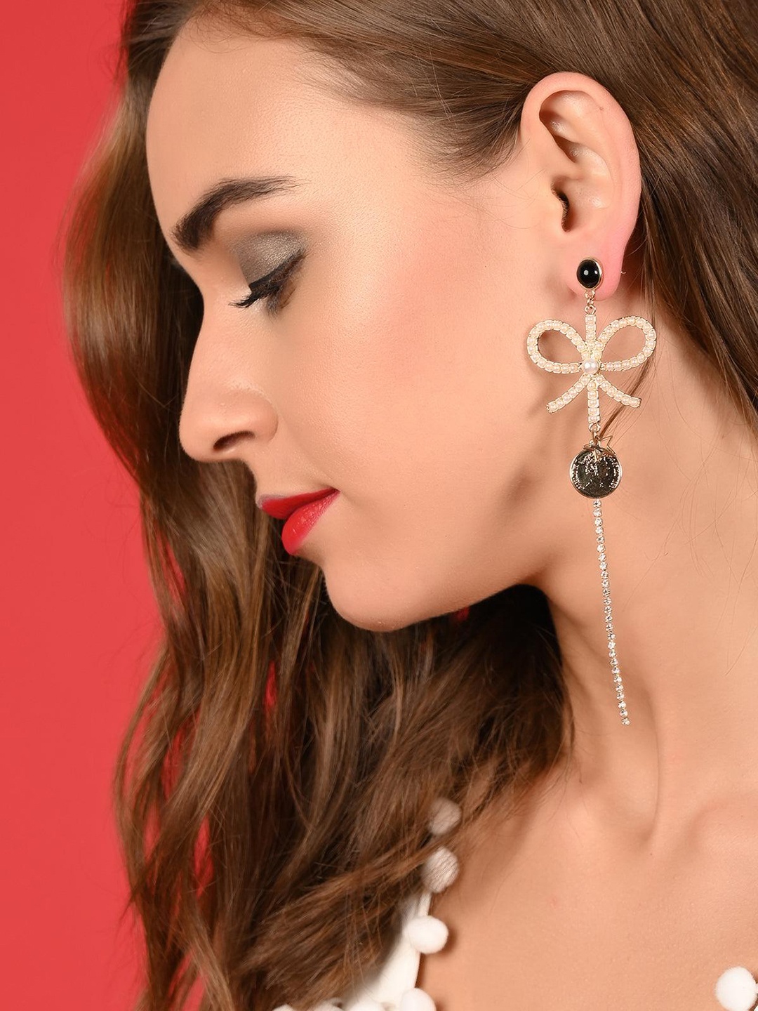 

ODETTE Gold-Plated Stone-Studded Knotted Design Single Tasselled Drop Earrings