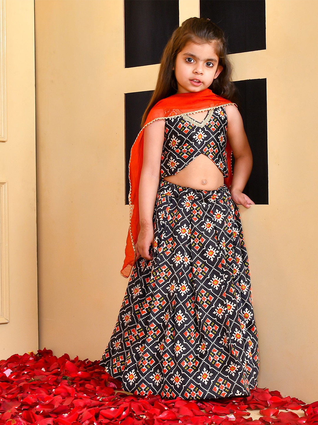 

Rangpur Girls Black & Orange Printed Silk Lehenga & Blouse With Dupatta