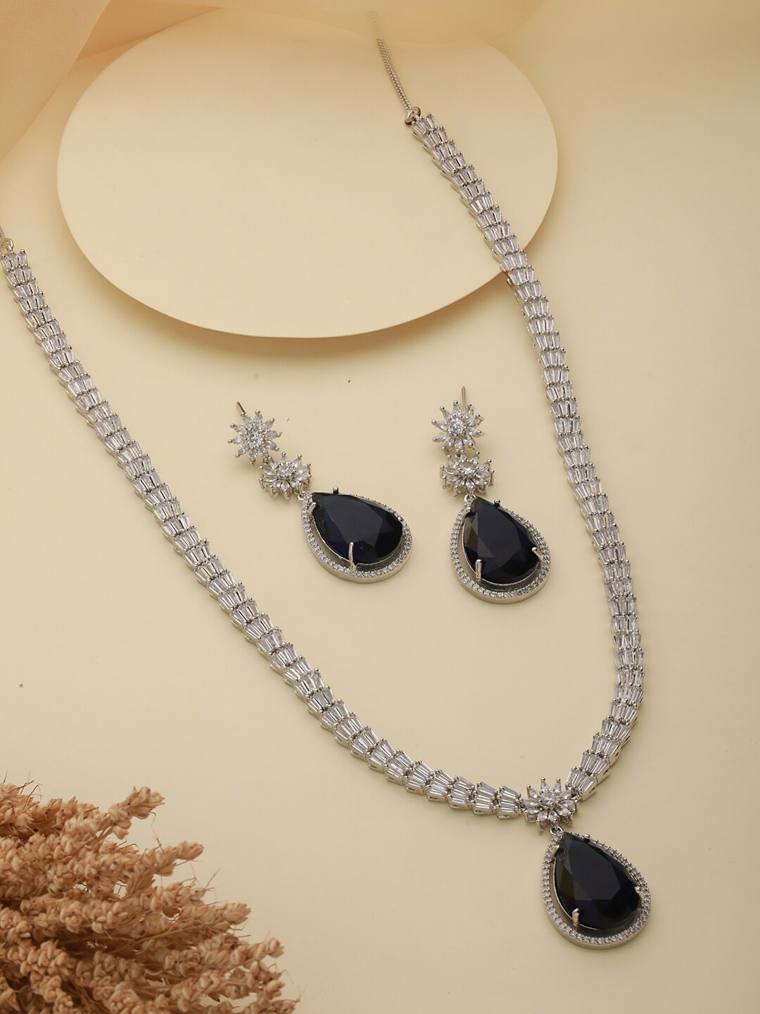 

Priyaasi Silver-Plated Baguette Teardrops American Diamonds Necklace & Earrings