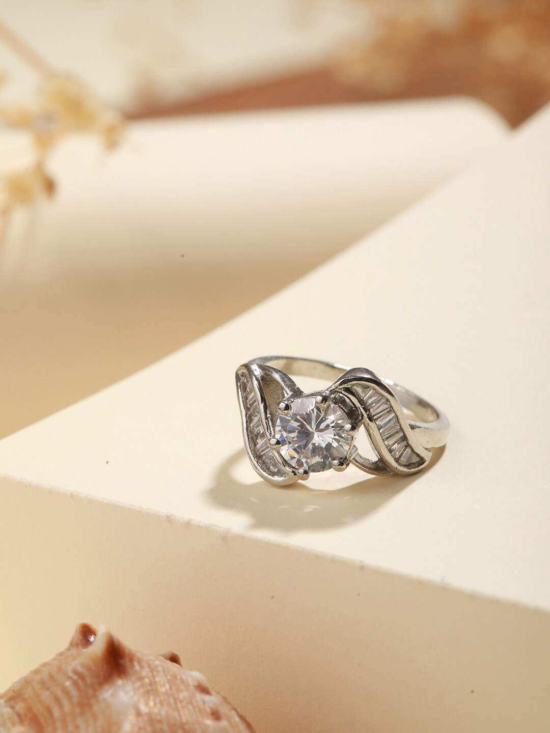 

Priyaasi Silver-Plated Solitaire Leaves American Diamond Finger Ring