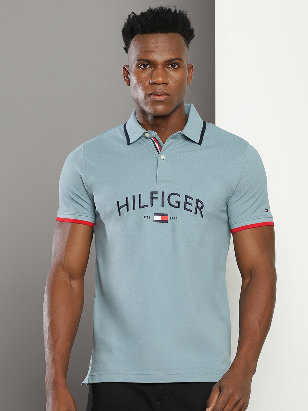 

Tommy Hilfiger Typography Printed Polo Collar Slim Fit Cotton Casual T-shirt, Blue