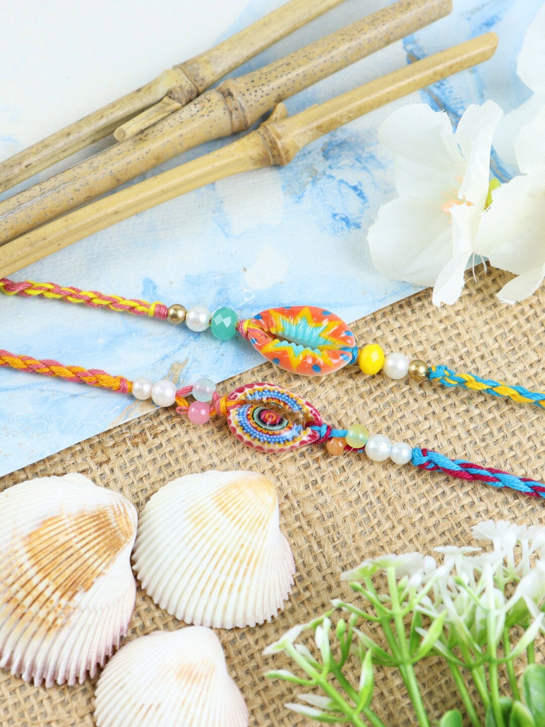 

Asthetika Men Set Of 2 Shall Charm Detail Rakhis, Orange