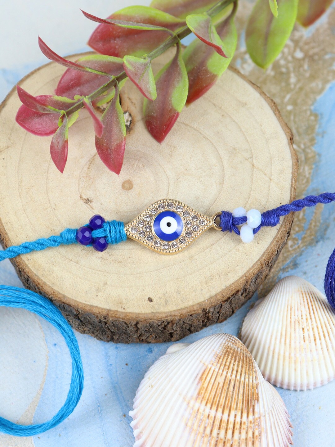 

Asthetika Men Stone-Studded & Beaded Evil Eye Charm Details Rakhi, Navy blue