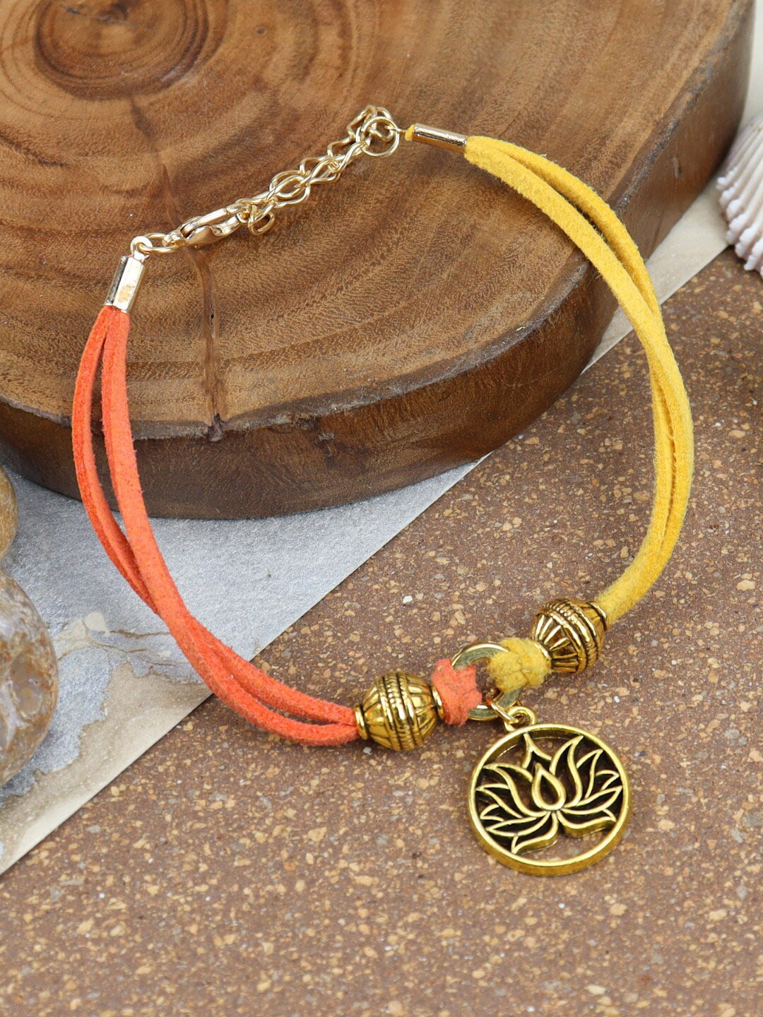 

Asthetika Women Lotus Charm Multistrand Rakhi, Orange