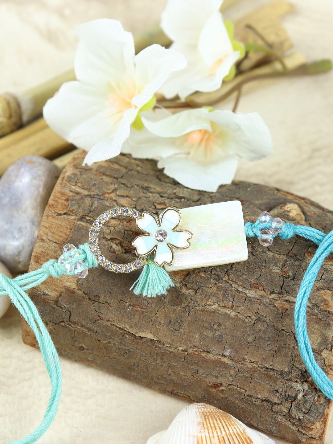 

Asthetika Men Floral Charm & Beaded Thread Rakhi, Blue