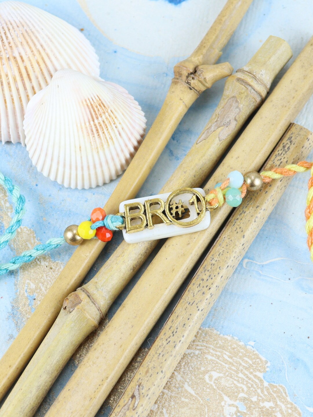 

Asthetika Men Bro Number 1 Charm Rakhi, Blue