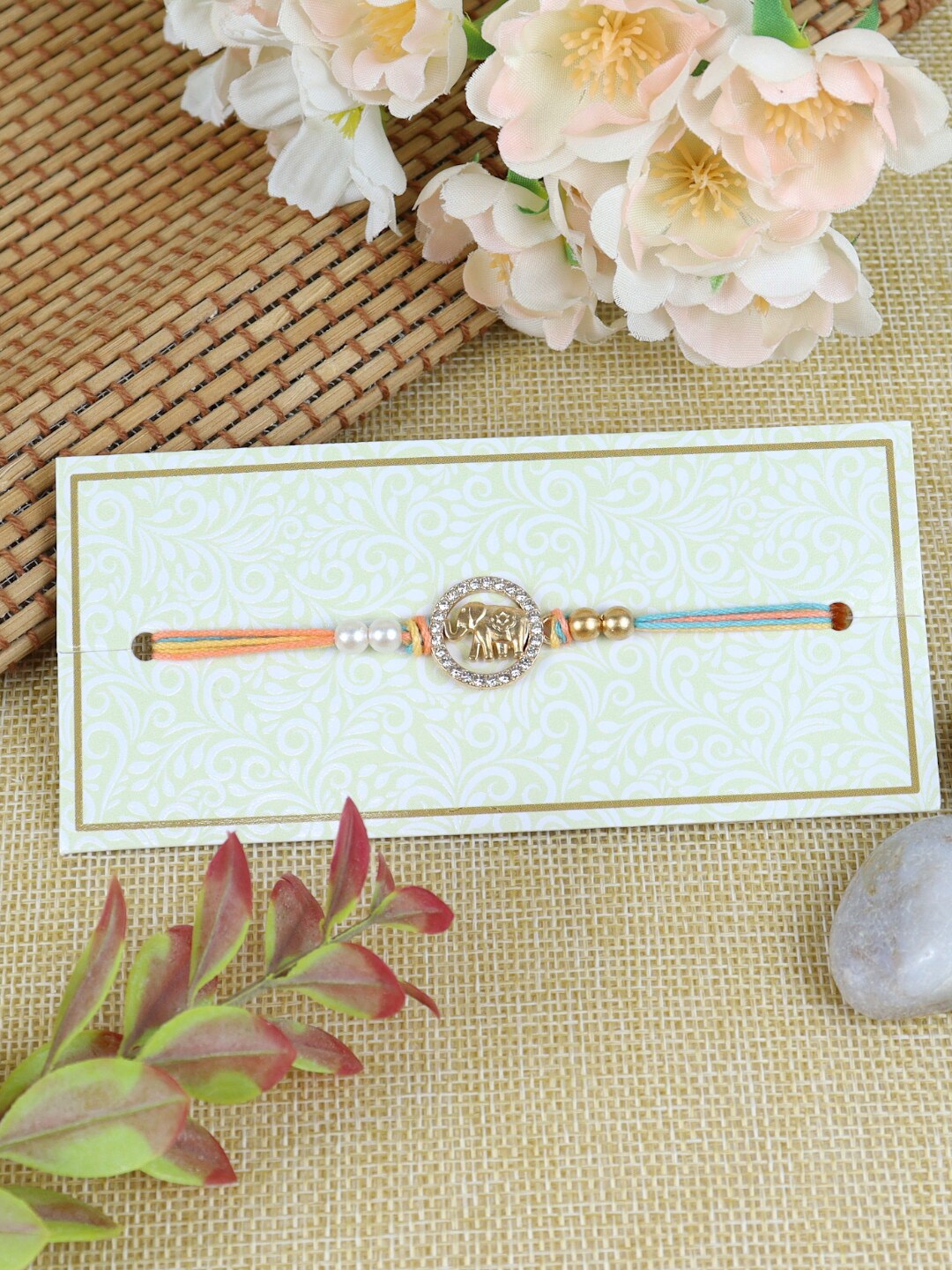 

Asthetika Men Elephant- Motif With Stone Studded & Beaded Thread Rakhi, Orange